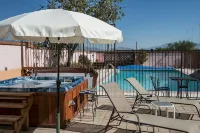 Beautiful home with pool,  private, close to UA & Downtown, arts. Great prices!