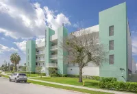 BRAND NEW LUXURY CONDO WITH HEATED POOL - 1 BLOCK FROM GULF W/ WATER VIEWS!!
