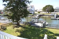 Short walk to the beach Dog friendly too! Docking for boaters!