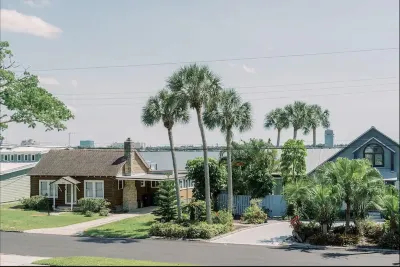 Charming historic Little Blue House with a water view.