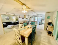 Charming 2/2 waterfront farm home with tons of TV stations, WiFi, dock, & more