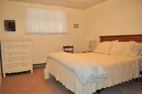 Two Bedroom Across from Outlet Pond on edge of village and wooded trails.