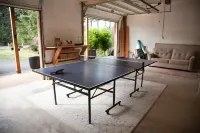 private hot tub, fun game room, cozy beach house