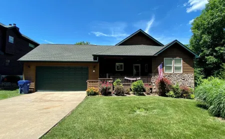 Nestled by the 7th green, large deck areas. Movie theatre for inside or out.