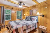 Secluded cabin surrounded by mountains, waterfalls, wildlife, and 50,000 acres