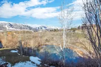 Two level condo with gourmet kitchen, upstairs remodel, and outdoor wonderland.