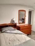 “The Red House”  Family Friendly Vacation Home Close to Beach and Lake Access.