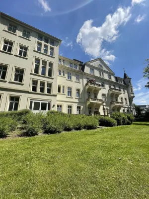 Vacation apartment with balcony overlooking the spa gardens of Bad Rothenfelde