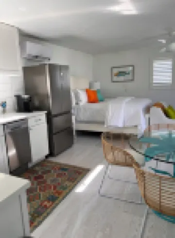 The Historic Coquina Cottages C is 2 Blocks to the Beach, 5th Avenue and 3rd St.