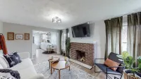 Touchdown Bungalow: Charming HOF Village Home