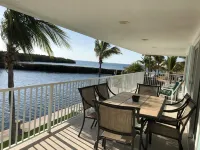 Coconut Sunsets Open Water Views, Ice, Pool, Spa 100 ft dockage, Putting Green