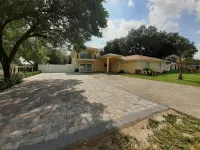 2 houses 5bed 4bath heated pool prime location