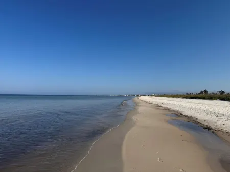 Stylish Home-Private Heated Pool-HotTub, Walk to Beach, Bikes,EV Charger & More!