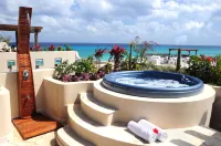 El Taj Oceanfront and Beachside Condo Hotel