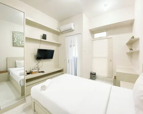 Minimalist and Homey Studio Room at Amartha View Apartment Hotels in Ngaliyan