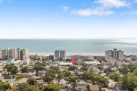 Charming Beach Cottage with Community Pool - Cozy Coastal Escape