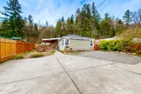 Dog-friendly riverfront home with patio, golf nearby, enclosed yard, & W/D Hotels near Albertsons