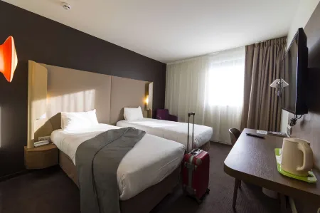 Campanile le Mans Centre Gare Отели в г. Руйон