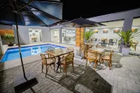 Pousada Cadiz - Piscina Climatizada Hotels in Bertioga