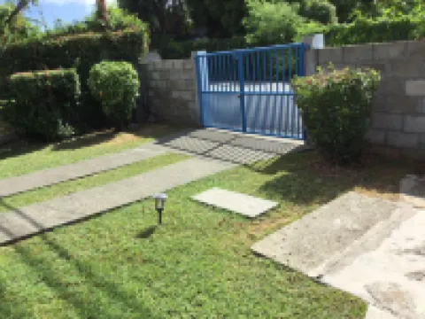 Lorna's Cottage Hotels near A.N.R. Robinson International Airport