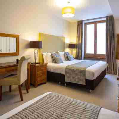 Inverness City Suites Rooms
