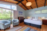 Drop Anchor at Enclosure Bay Beach by Waiheke Unlimited Hotels near Waiheke Musical Museum