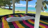 Vaiula Beach Fales Hotels in Utulaelae