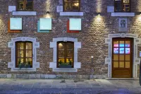 Les Tanneurs Hotels near Passion Garden Theater