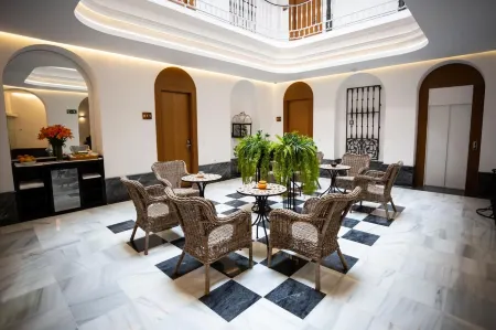 Plazuela del Carbón Suites Отели рядом с достопримечательностью «Convento de San Francisco»
