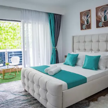 Maskan Suites Отели рядом с достопримечательностью «Торговый центр Yaya Centre»