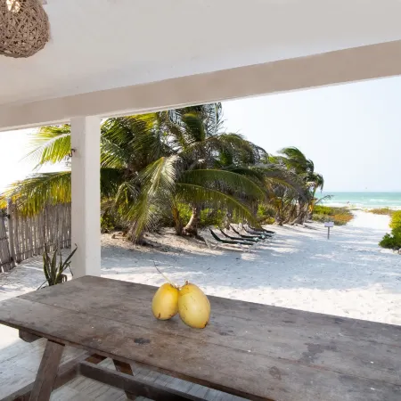 Arena y Mar Beachfront House, El Cuyo by the Spot Rentals
