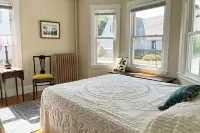 Centrally located off Back Cove, 1st floor 4 bedroom, 1.5 Bath condo w/ porch