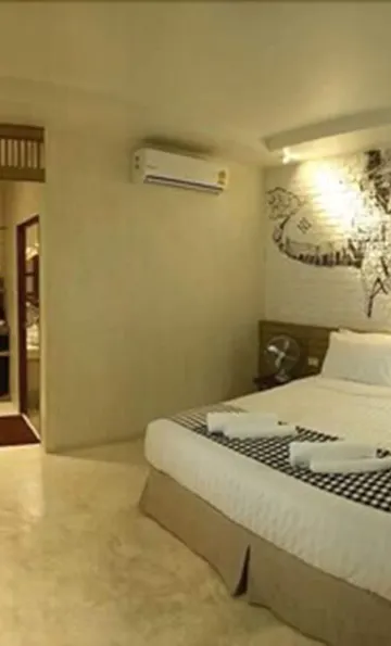 ห้องดีลักซ์ เตียงใหญ่ 1 เตียง