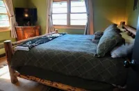 Lakeside Cabin with Sunset View & Fireplace