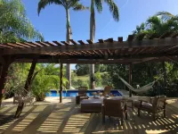 Wooden villa with private pool in a tropical garden 3 minutes from the beach - วิลล่า