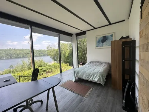 Modern Glass Cottage facing Lake with Hot tub Hotels in Algonquin Highlands