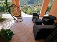 2 DOUBLE BEDS, MINI FRIDGE, COFFEE MACHINE, MICROWAVE OVEN, TABLE.