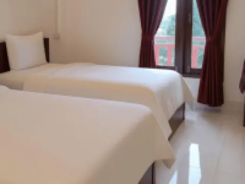 ศรีปันยา เกสต์เฮาส์ โรงแรมในโพนสะหวัน