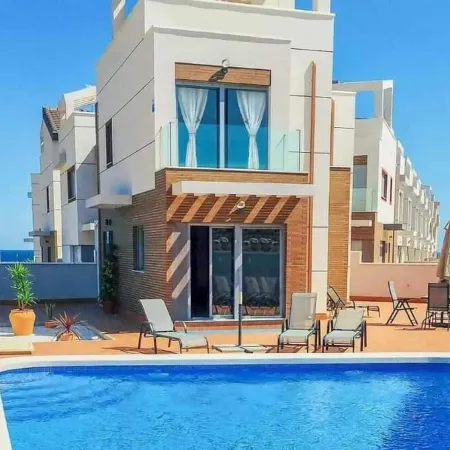 Beach villa with panoramic sea and mountain views