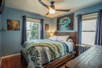 2BR with Pretty Art and Cinema Reclining Couches