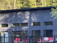 Birds Nest is a beautiful newly built home on Swanlake with 88 ft  of deck!! - 4-Star