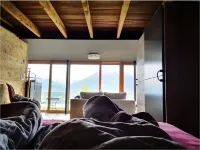 Chalet with Panoramic Views of the Mountains of the Oberland and Lake Thun Hotels in Sigriswil