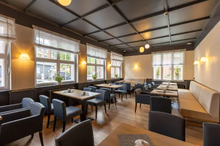 Comfort Hotel Tom Kyle Отели рядом с достопримечательностью «Кильский университет»