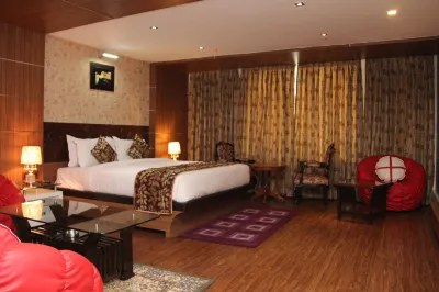 Maple Wood Hotels near K K Complex