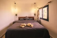 The Kozyhome Hotels in Tarmigte