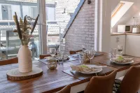 Huswell - Centrally Located Apartment with Sunny Terrace