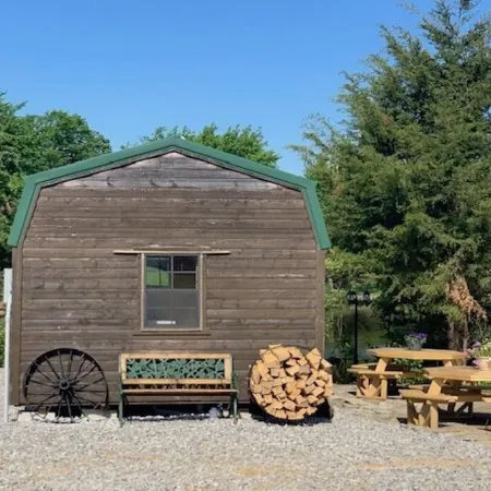 Big Mike's Cabin on the lake, next to ball diamonds nestled in 3 -cabin village