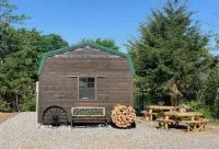 Big Mike's Cabin on the lake, next to ball diamonds nestled in 3 -cabin village