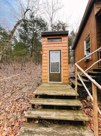Off Grid tiny cabin on riverfront property