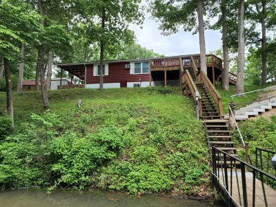 Secluded Lake of the Ozarks Vacation Home Waterfront with a Covered Dock.